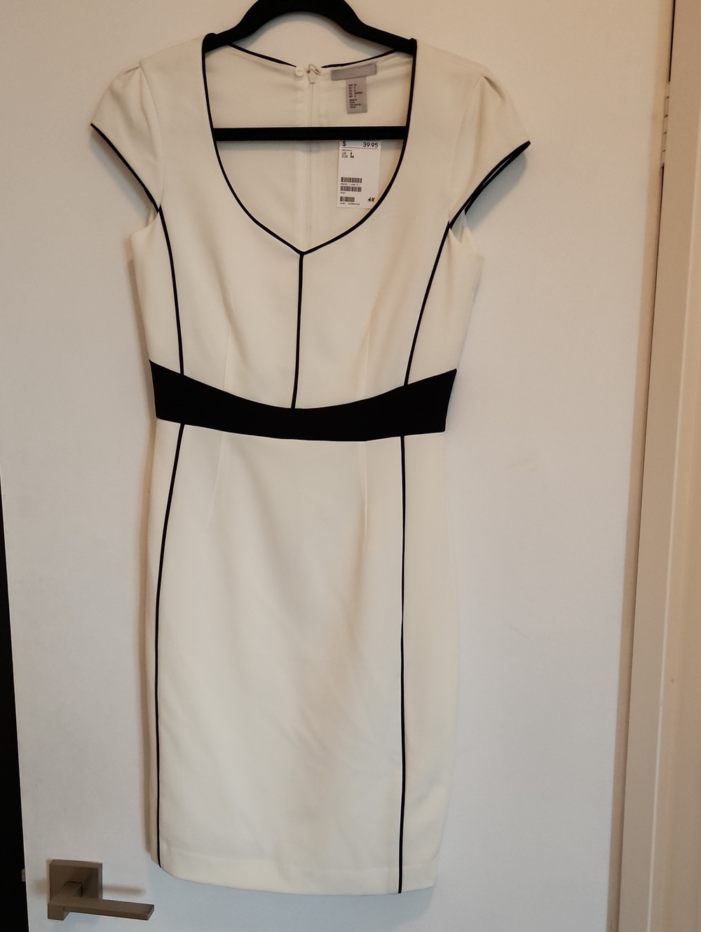Elegant Cream Cap-Sleeve Sheath Dress with Black Piping